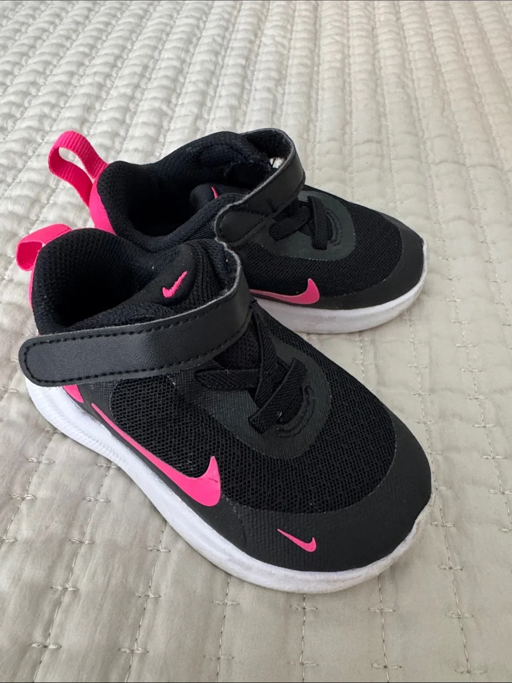 Nike Kids Black Sneakers with Pink Swoosh